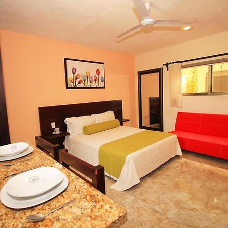 Papagayo Hotel Boutique 普拉亚卡门 外观 照片 A typical hotel room