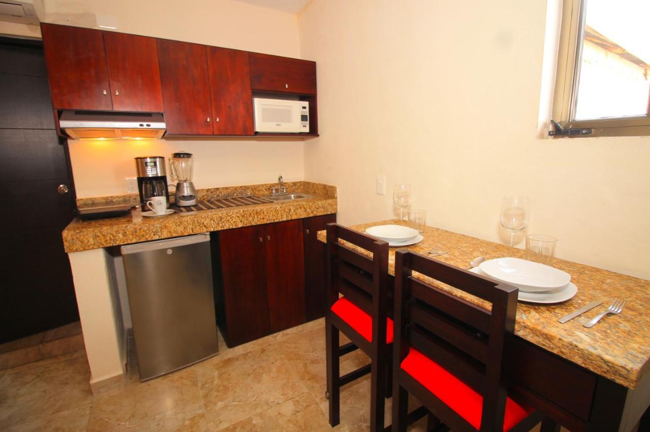 Papagayo Hotel Boutique 普拉亚卡门 外观 照片 A small kitchen