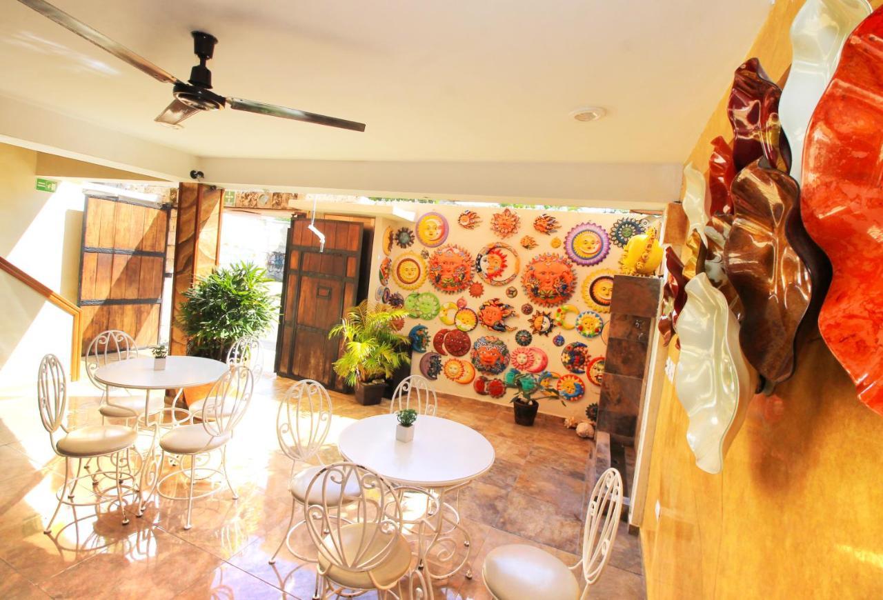 Papagayo Hotel Boutique 普拉亚卡门 外观 照片 The interior of the gallery