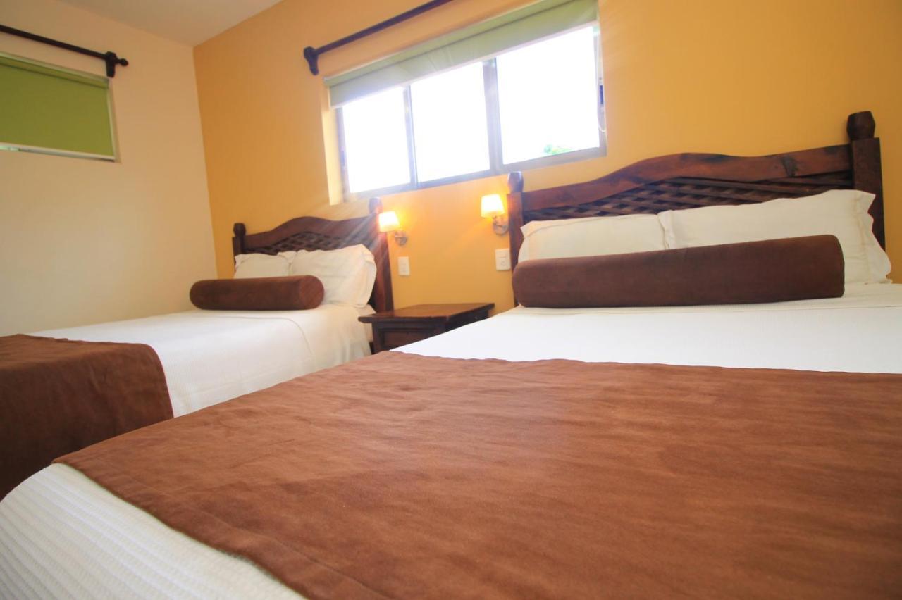 Papagayo Hotel Boutique 普拉亚卡门 外观 照片 A room at the hotel